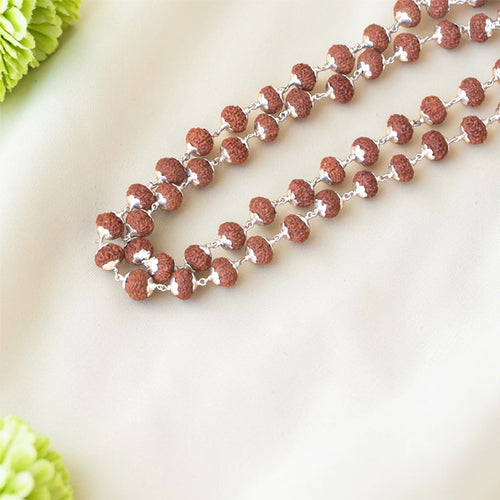 10 Mukhi Rudraksha Mala with Silver, handcrafted spiritual mala featuring authentic natural 10 Mukhi Rudraksha beads and premium silver accents for meditation, protection, and spiritual well-being