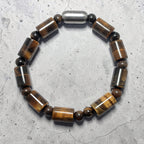 "Premium Tiger Stone Bracelet in cylinder shape with polished natural stone beads, crafted for elegance, beauty, and modern style."