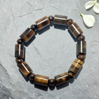 "Premium Tiger Stone Bracelet in cylinder shape with polished natural stone beads, crafted for elegance, beauty, and modern style."