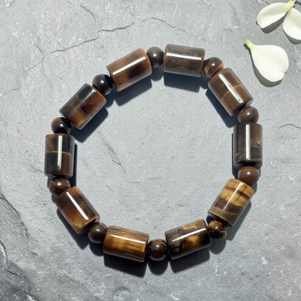 "Premium Tiger Stone Bracelet in cylinder shape with polished natural stone beads, crafted for elegance, beauty, and modern style."