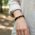 "Premium Tiger Stone Bracelet in cylinder shape with polished natural stone beads, crafted for elegance, beauty, and modern style."