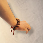 "Premium original 11 Mukhi Nepali Rudraksha Bracelet crafted with authentic Rudraksha beads, valued for spiritual significance and traditional elegance."