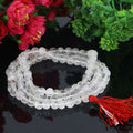 "Premium Smoky Sphatik Mala with polished smoky crystal beads, crafted for elegance, clarity, and spiritual significance."