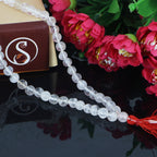 "Premium Smoky Sphatik Mala with polished smoky crystal beads, crafted for elegance, clarity, and spiritual significance."