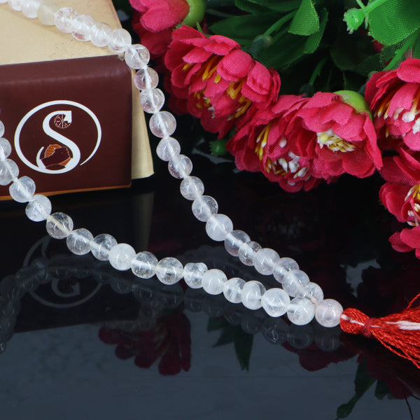 "Premium Smoky Sphatik Mala with polished smoky crystal beads, crafted for elegance, clarity, and spiritual significance."