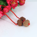 "Premium Kaal Sarp Dosh Kavach with original 8 Mukhi, 9 Mukhi, and 10 Mukhi Rudraksha beads, crafted with spiritual significance and traditional elegance."
