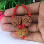 "Premium Rudraksha Kavach for Attraction & Luxury with two original 6 Mukhi Rudraksha beads and one 13 Mukhi Rudraksha, crafted with spiritual significance and traditional elegance."