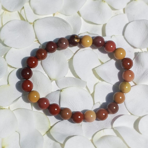 "Premium natural Mookaite Stone Bracelet with polished gemstone beads, crafted for elegance, beauty, and positive energy."