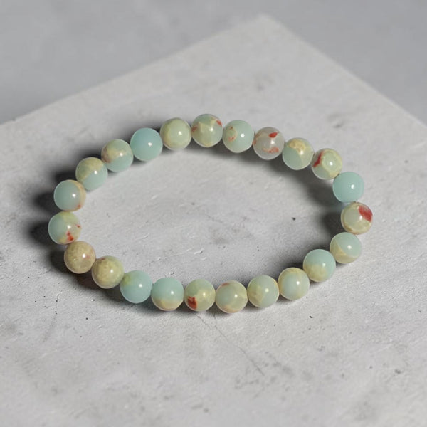"Premium natural Caribbean Calcite Stone Bracelet with polished gemstone beads, crafted for elegance, beauty, and positive energy."