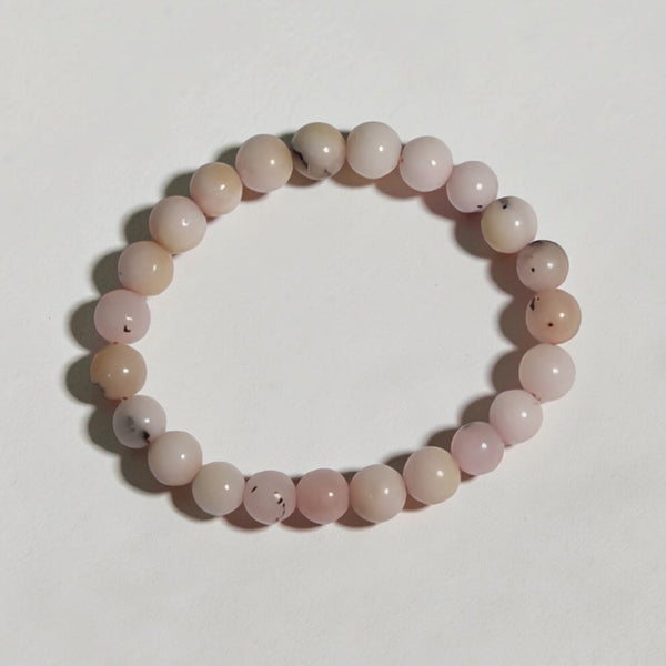 "Premium natural Pink Opal Stone Bracelet with polished gemstone beads, crafted for elegance, beauty, and positive energy."