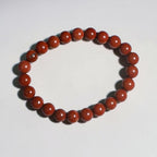 "Premium natural Red Jasper Stone Bracelet with polished gemstone beads, crafted for elegance, beauty, and positive energy."