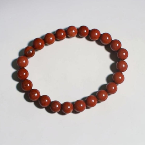 "Premium natural Red Jasper Stone Bracelet with polished gemstone beads, crafted for elegance, beauty, and positive energy."