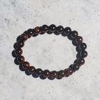 "Premium natural Red Tiger Stone Bracelet with polished gemstone beads, crafted for elegance, beauty, and positive energy."