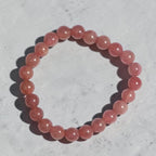 "Premium natural Strawberry Quartz Stone Bracelet with polished gemstone beads, crafted for elegance, beauty, and positive energy."