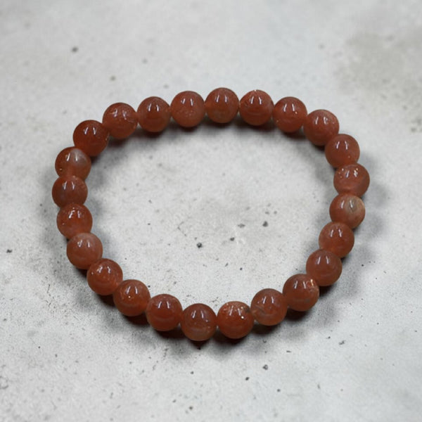 "Premium natural Sunstone Bracelet with polished gemstone beads, crafted for elegance, beauty, and positive energy."