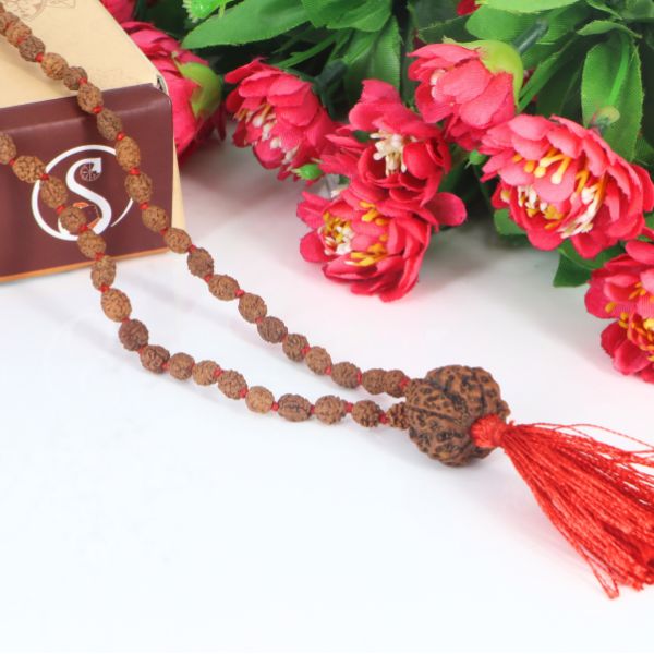 "Premium original 4 Mukhi Rudraksha Mala with 4 Mukhi Meru, crafted with authentic Rudraksha beads for spiritual significance and traditional elegance."