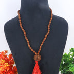 "Premium original 4 Mukhi Rudraksha Mala with 4 Mukhi Meru, crafted with authentic Rudraksha beads for spiritual significance and traditional elegance."