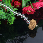 "Premium Rudraksha Kavach for Vehicle Protection with 10 natural Sphatik beads and one original 11 Mukhi Rudraksha, crafted with spiritual significance and traditional elegance."