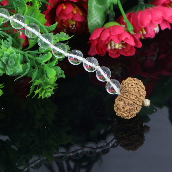 "Premium Rudraksha Kavach for Vehicle Protection with 10 natural Sphatik beads and one original 11 Mukhi Rudraksha, crafted with spiritual significance and traditional elegance."