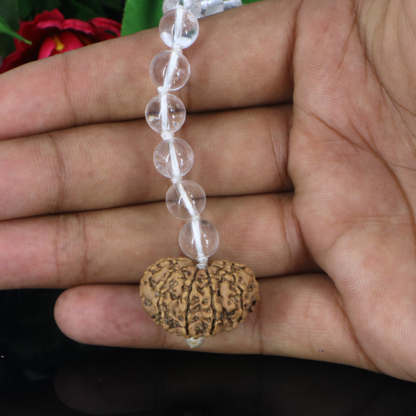 "Premium Rudraksha Kavach for Vehicle Protection with 10 natural Sphatik beads and one original 11 Mukhi Rudraksha, crafted with spiritual significance and traditional elegance."