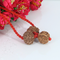 "Premium Lakshmi Ganesha Rudraksha Kavach with two 7 Mukhi Rudraksha beads and original Ganesh Rudraksha, crafted for spiritual significance and elegant traditional wear."