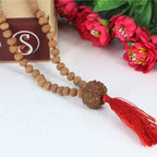 "Premium original 7 Mukhi Rudraksha Mala with 7 Mukhi Meru, crafted with authentic Rudraksha beads for spiritual significance and traditional elegance."