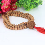 "Premium original 7 Mukhi Rudraksha Mala with 7 Mukhi Meru, crafted with authentic Rudraksha beads for spiritual significance and traditional elegance."
