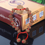 "Premium 9 Mukhi Rudraksha Bracelet with original Nepali and Indonesian Rudraksha beads, crafted for spiritual significance and traditional elegance."