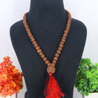 "Premium original 9 Mukhi Rudraksha Mala with 9 Mukhi Meru, crafted with authentic Rudraksha beads for spiritual significance and traditional elegance."