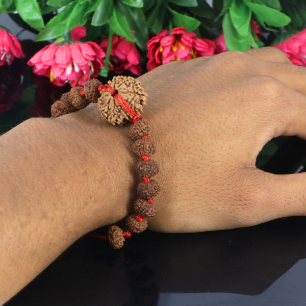 "Premium 9 Mukhi Rudraksha Bracelet with original Nepali and Indonesian Rudraksha beads, crafted for spiritual significance and traditional elegance."