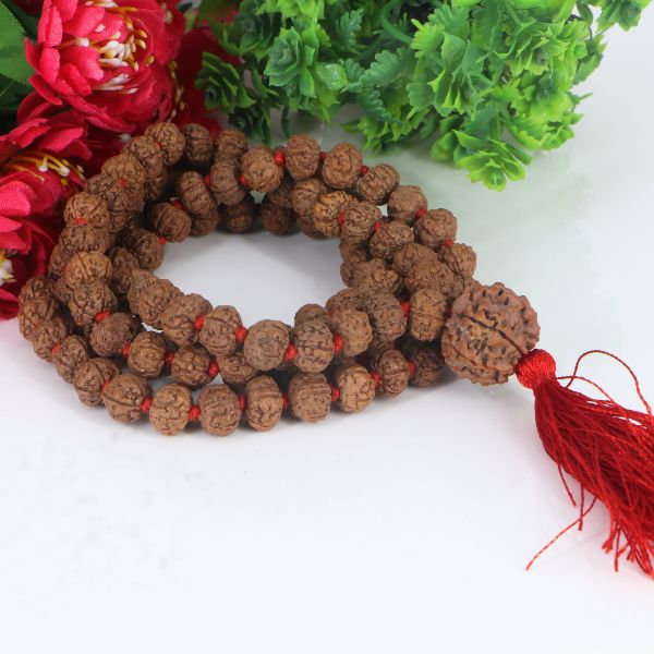 "Premium original 9 Mukhi Rudraksha Mala with 9 Mukhi Meru, crafted with authentic Rudraksha beads for spiritual significance and traditional elegance."