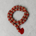 "Premium original 4 Mukhi Nepali Rudraksha Kantha Mala crafted with authentic Rudraksha beads, valued for spiritual significance and traditional elegance."