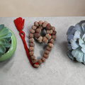 "12 Mukhi Nepali Rudraksha Kantha made with authentic Rudraksha beads in a traditional and spiritual design."