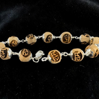"Ram Naam Tulsi Bracelet with pure silver elements, crafted from sacred Tulsi beads with spiritual and elegant design."