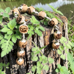 "Ram Naam Tulsi Bracelet with pure silver elements, crafted from sacred Tulsi beads with spiritual and elegant design."