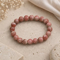 "Premium natural Rhodochrosite Stone Bracelet with polished gemstone beads, crafted for elegance, beauty, and positive energy."