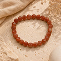 "Premium natural Sunstone Bracelet with polished gemstone beads, crafted for elegance, beauty, and positive energy."