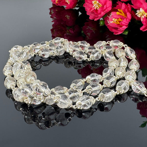 "Premium 54+1 Beads Sphatik Mala with pure silver, featuring natural crystal beads for elegance, clarity, and spiritual significance."