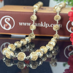 "Radha Naam Tulsi Mala with pure silver elements, crafted from sacred Tulsi beads with elegant spiritual detailing."