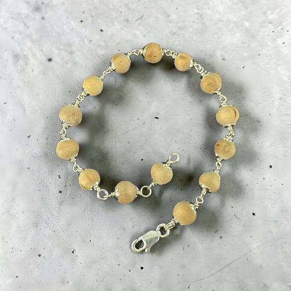 "Premium Clean Bead Tulsi Bracelet with pure silver, made from sacred Tulsi beads for spirituality, devotion, and traditional elegance."