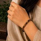 "Premium natural Tiger Eye Stone Bracelet with polished gemstone beads, crafted for elegance, beauty, and positive energy."