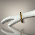 "Premium natural Tiger Eye Stone Bracelet with polished gemstone beads, crafted for elegance, beauty, and positive energy."