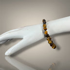"Premium Diamond Cut Tiger Eye Stone Bracelet with polished faceted gemstone beads, crafted for elegance, beauty, and positive energy."